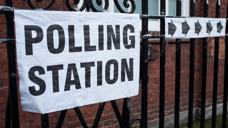 A photo of a polling station sign