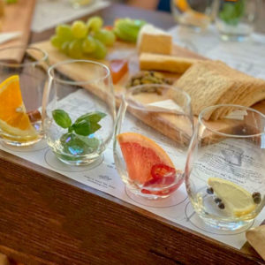 Image of 4 gin glasses with fruit in each