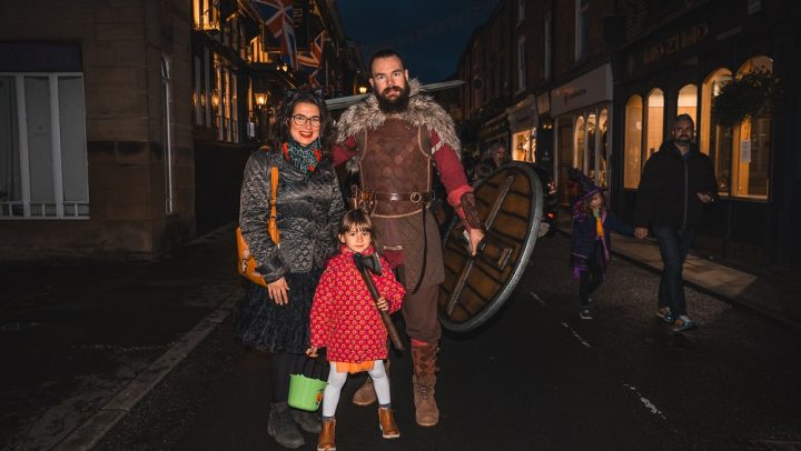 A viking at the Pumpkin Path event with his family