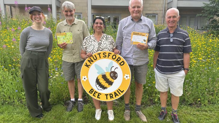 Katie Clague, Kevin Griffiths, Cllr April Johnson, Cllr Rex Mears and Malcolm Thomas with the Bee Trail Sign