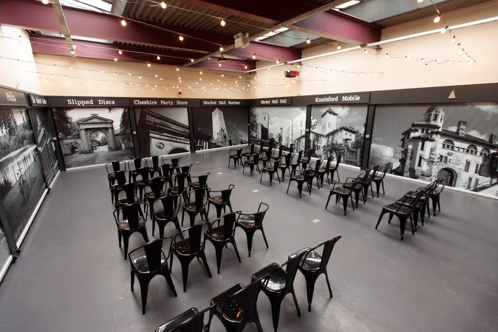 Knutsford Market Hall with chairs set out theatre style