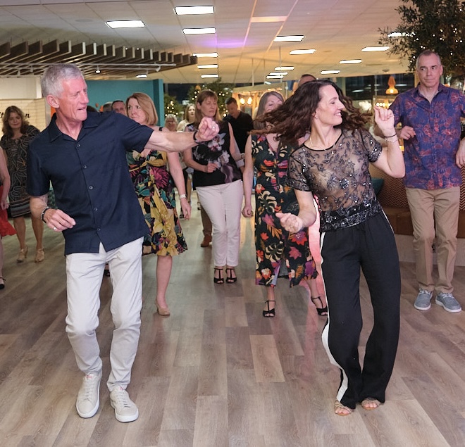 People in a hall dancing