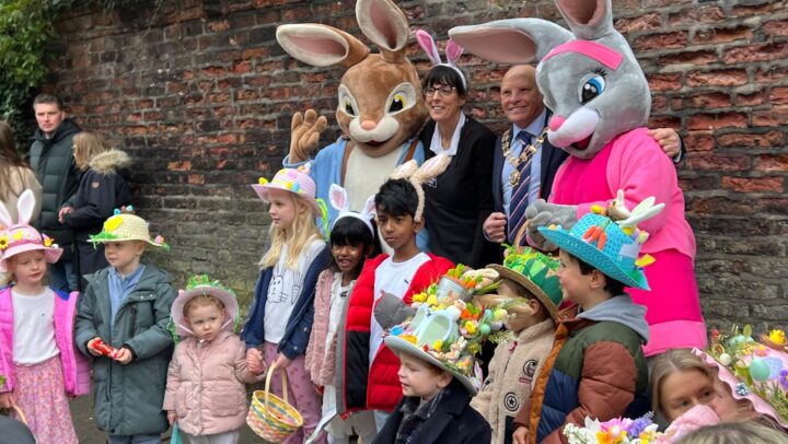 Pictured Knutsford Mayor Cllr Bryan Hartley and Julia Chard from Knutsford Olde Sweet Shoppe with children who took part in the Easter Bonnet Competition.