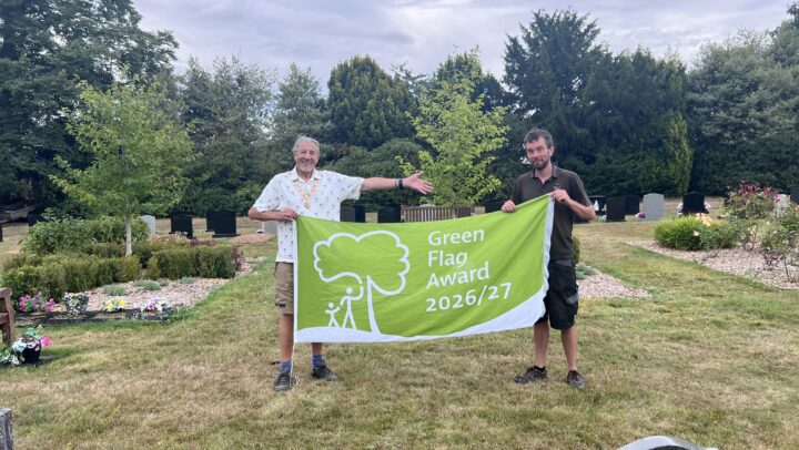 Town Mayor Peter Coan and Cemetery Groundskeeper Fergal Owens holding Green Flag Award